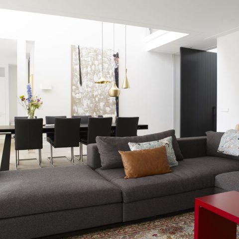 Outdated bungalow becomes an imposing villa