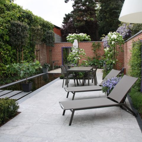 City garden with ornamental pond