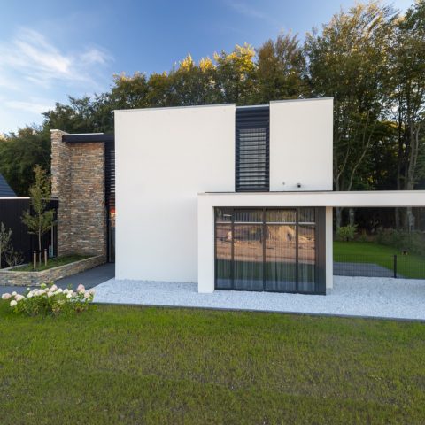 Cubist house with natural stone facade in Ede