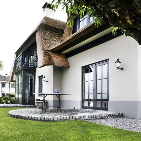 Thatched classic home with contemporary details