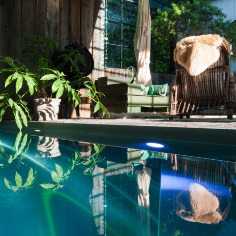 Stainless steel pool in villa garden Deurle