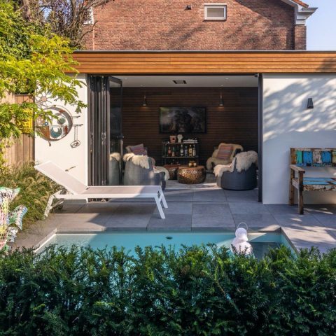 Small modern garden with plunge pool and veranda