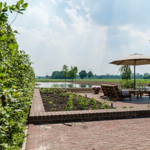 Farm garden with natural pond