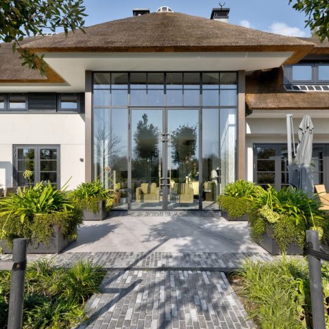 Residential house with steel facades