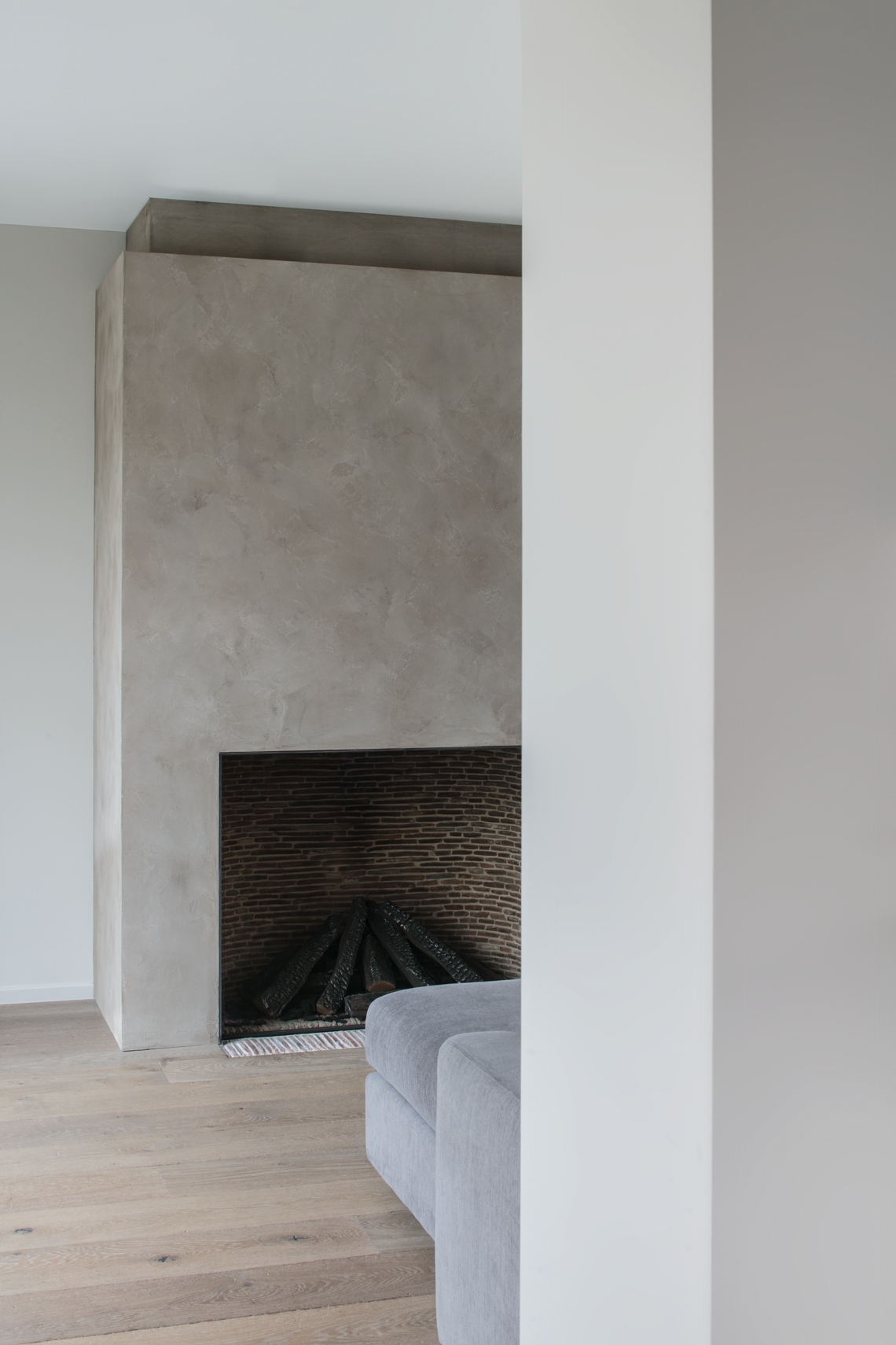 Luxury living room with designer furniture ,Fireplace,Indoors,Hearth,Cushion,Pillow,Concrete,Interior Design,Corner,Housing,Corridor, Luxury, Design, Exclusive, Modern, Custom Made, Special, Beautiful
