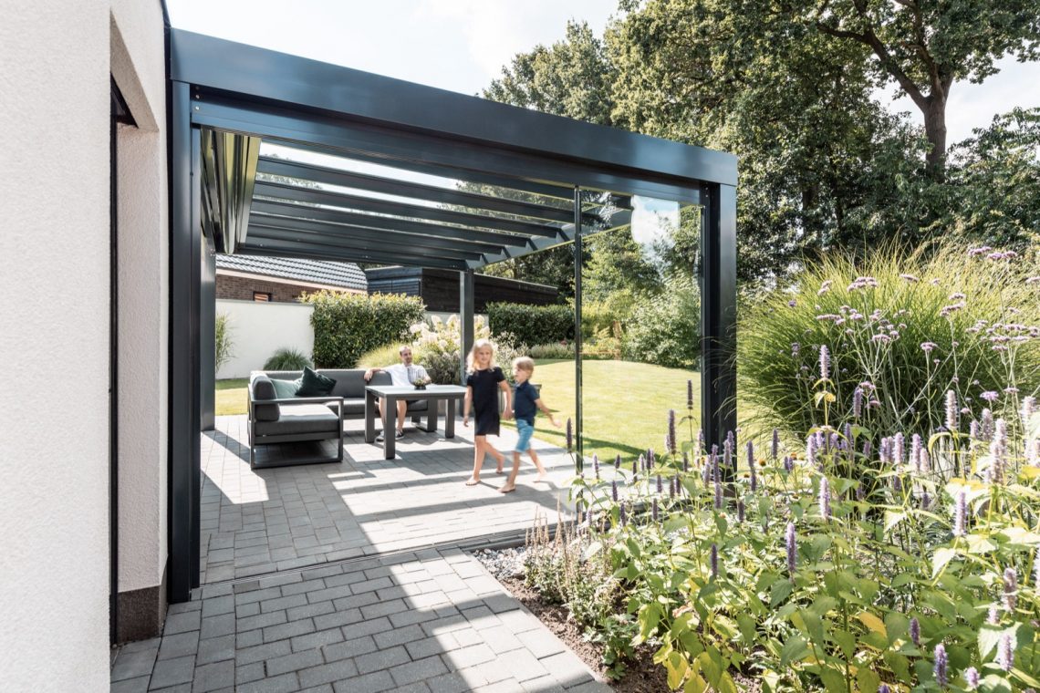 Luxury furniture in a spacious garden ,Person,Porch,Patio,Pergola,Outdoors,Dining Table,Table,Terrace,Grass,Garden, Luxury, Design, Exclusive, Modern, Custom Made, Special, Beautiful