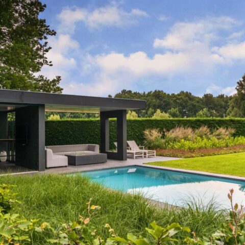 Modern garden with pool house and pool
