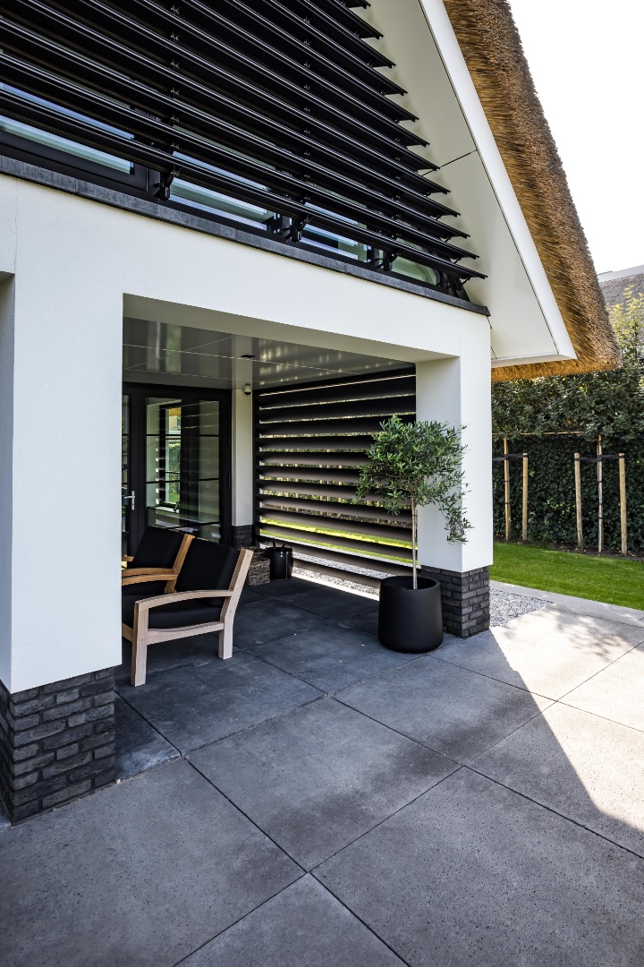 Modern facade of a luxury villa ,Building,Housing,Door,Tabletop,Furniture,Patio,Chair,Concrete,Villa,Slate, Luxury, Design, Exclusive, Modern, Custom Made, Special, Beautiful