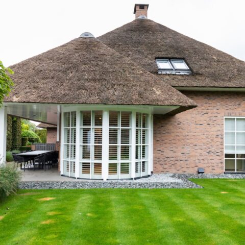 Round bay window with attractive shutters