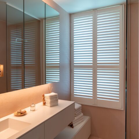 Unique home with various colors of shutters