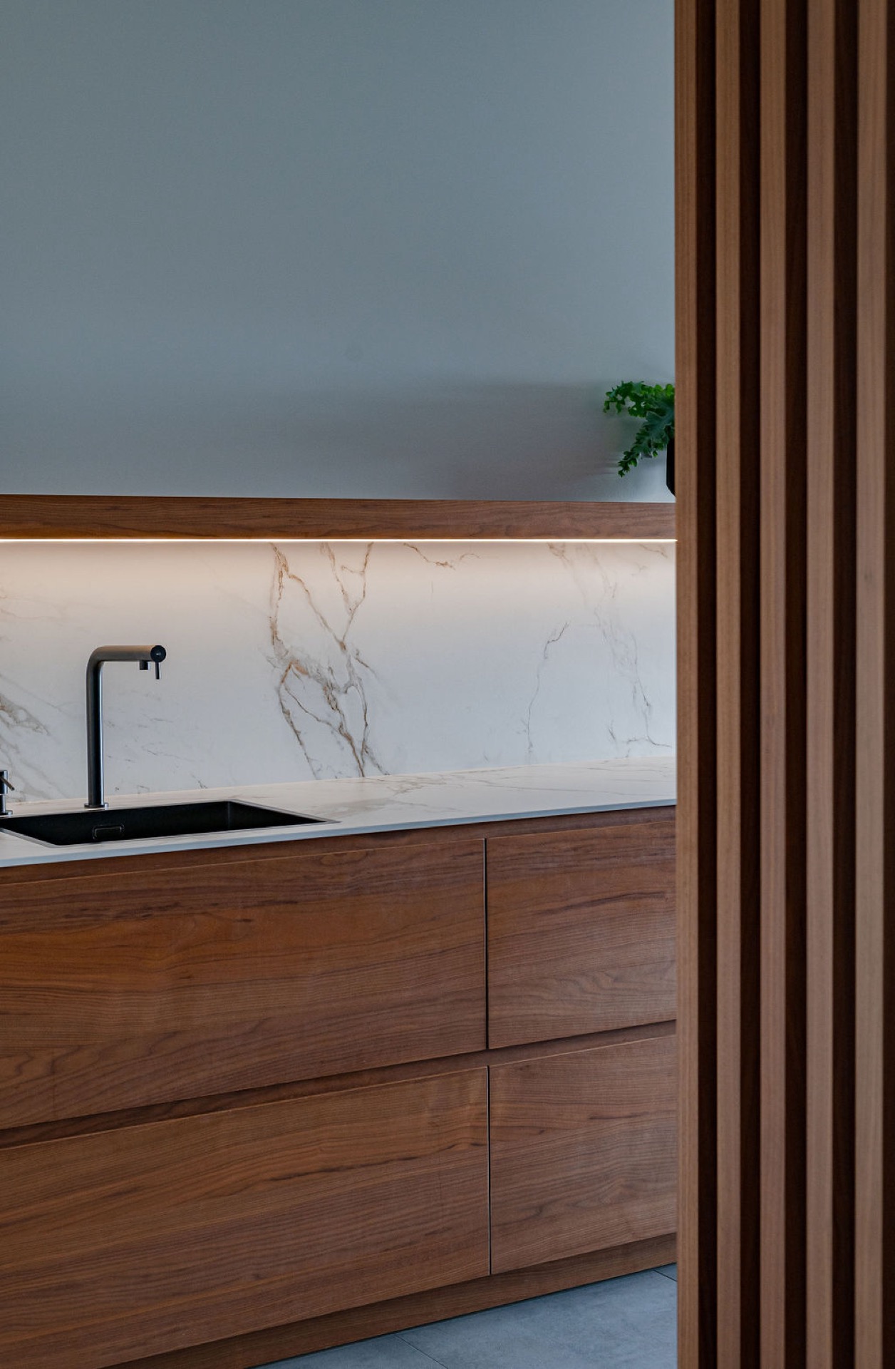 Wooden kitchen with marble top,Wood,Hardwood,Door,Interior Design,Corner,Plywood,Furniture,Sink,Stained Wood,Sink Faucet, Luxury, Design, Exclusive, Modern, Custom Made, Special, Beautiful