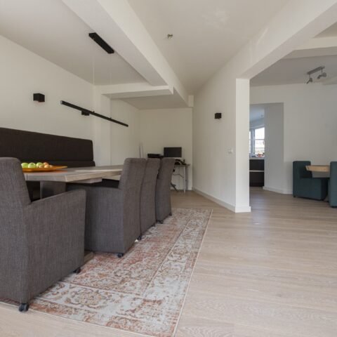 White oiled parquet floor in bright home