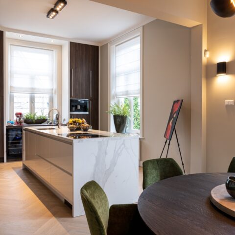 Unique modern kitchen with a white marble-look worktop