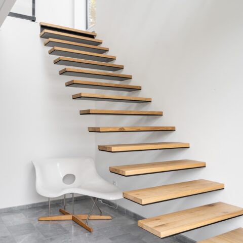 Floating steel staircase with solid oak treads