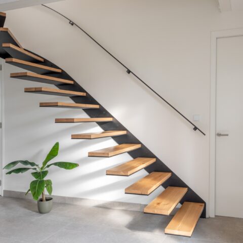 Steel staircase with floating oak treads