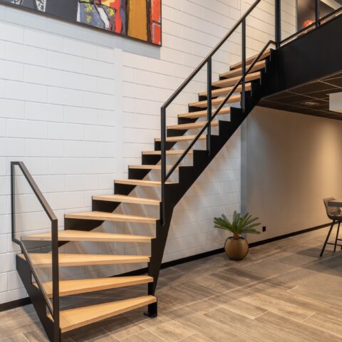 Steel staircase with lower quarter and solid oak treads