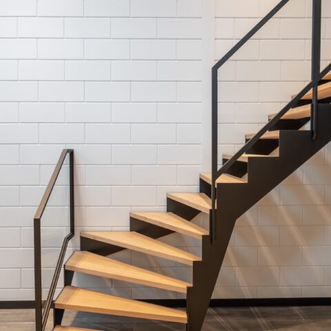 Steel staircase with lower quarter and solid oak treads