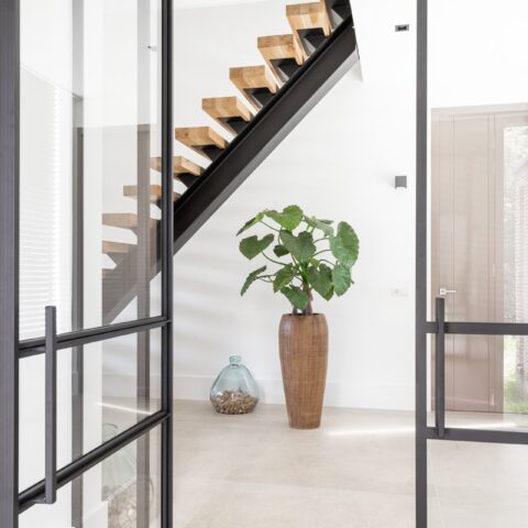 Large steel pivot doors