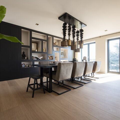 Wide oak plank flooring in spacious apartment