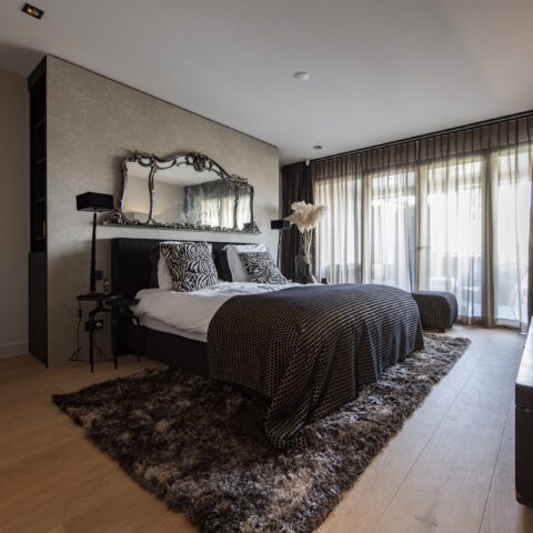 Wide oak plank flooring in spacious apartment