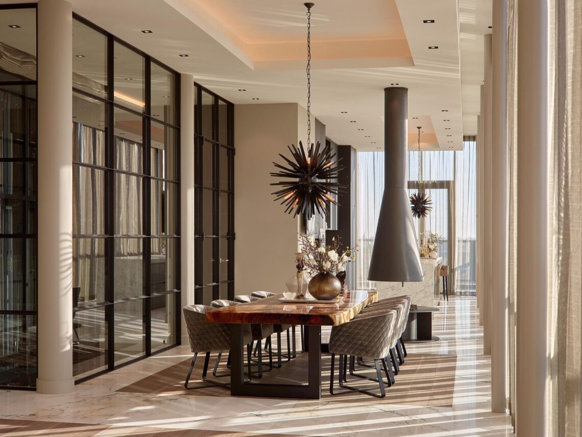 a room filled with furniture and a large window