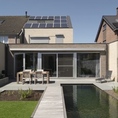 Sleek garden with swimming pond