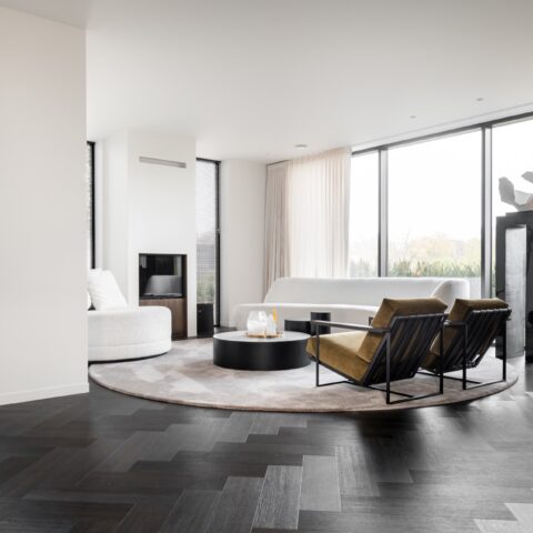 a living room filled with furniture and a large window,Flooring,Furniture,Floor,Interior Design,Indoors,Table,Living Room,Room,Housing,Coffee Table, Luxury, Design, Exclusive, Modern, Custom Made, Special, Beautiful