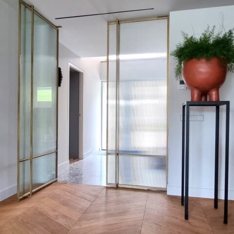 Double brass pivot doors