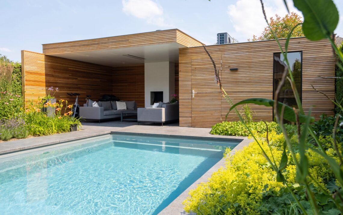 Modern garden with swimming pool pool house and sauna