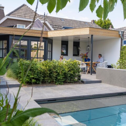 Modern garden with swimming pool pool house and sauna