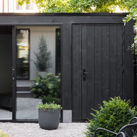 Custom wooden garden office in city garden
