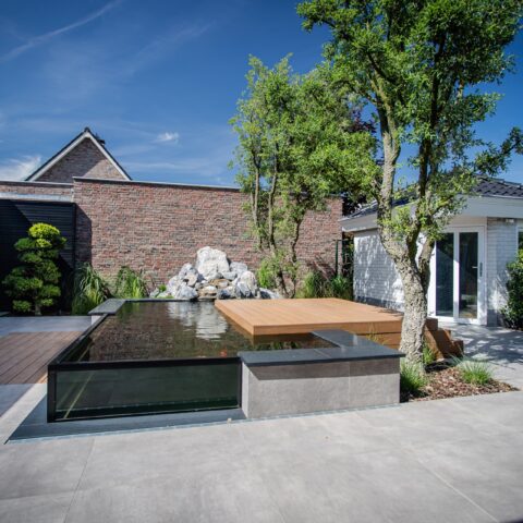 Project tuin met koivijver, sauna en tuinkamer