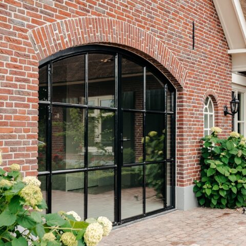 Exterior steel door in a residential farmhouse