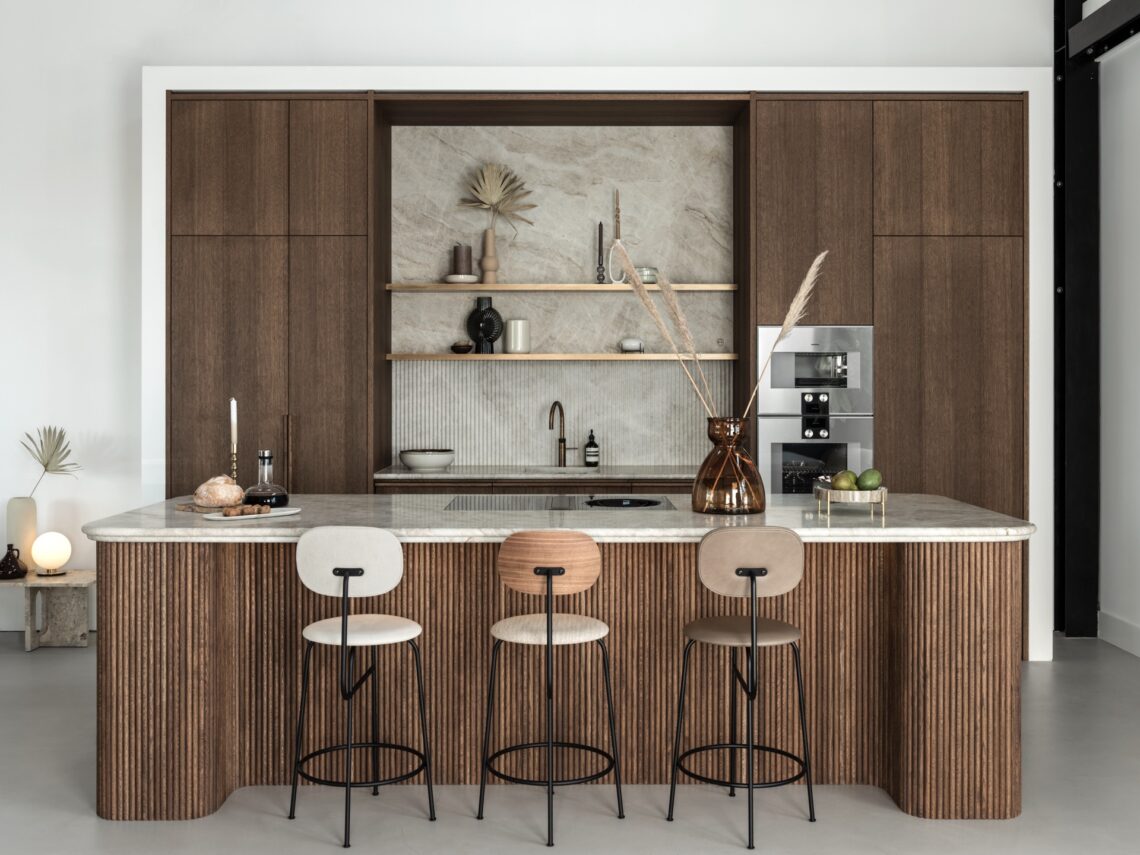 High-End Kitchen Design With Breakfast Bar In Penthouse photo
