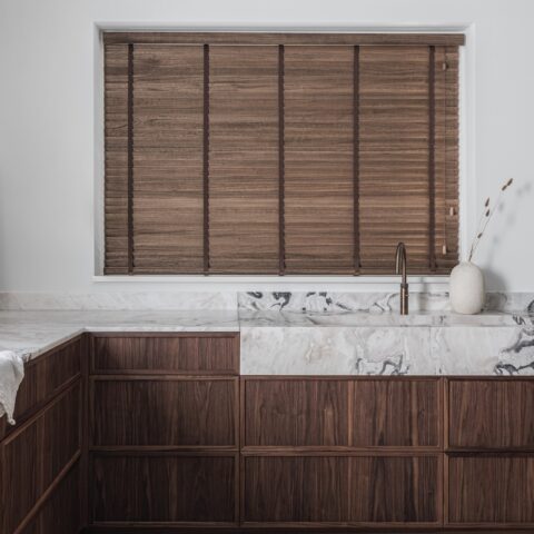 Stylish walnut kitchen with pronounced top