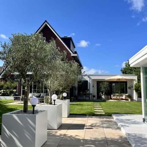 Tuinontwerp met aanbouw en veranda