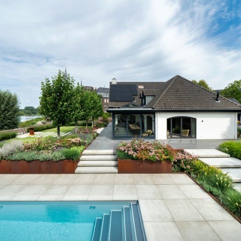 Modern garden with pool and water view