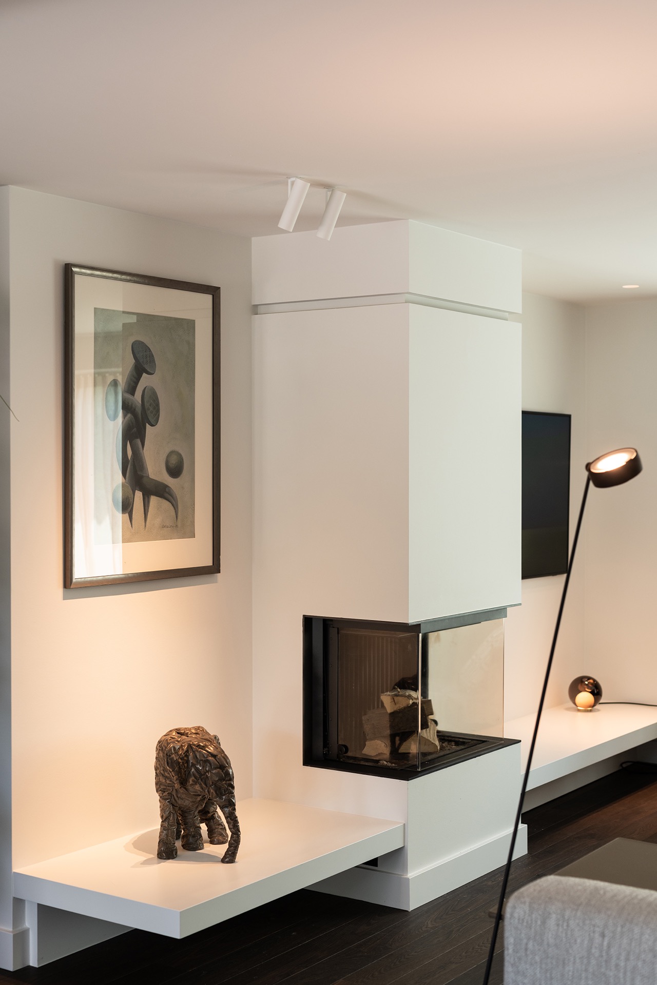 luxury full home interior: custom white wall niches with a view to an open fireplace and dark flooring, Luxury, Design, Exclusive, Modern, Custom Made, Special, Beautiful