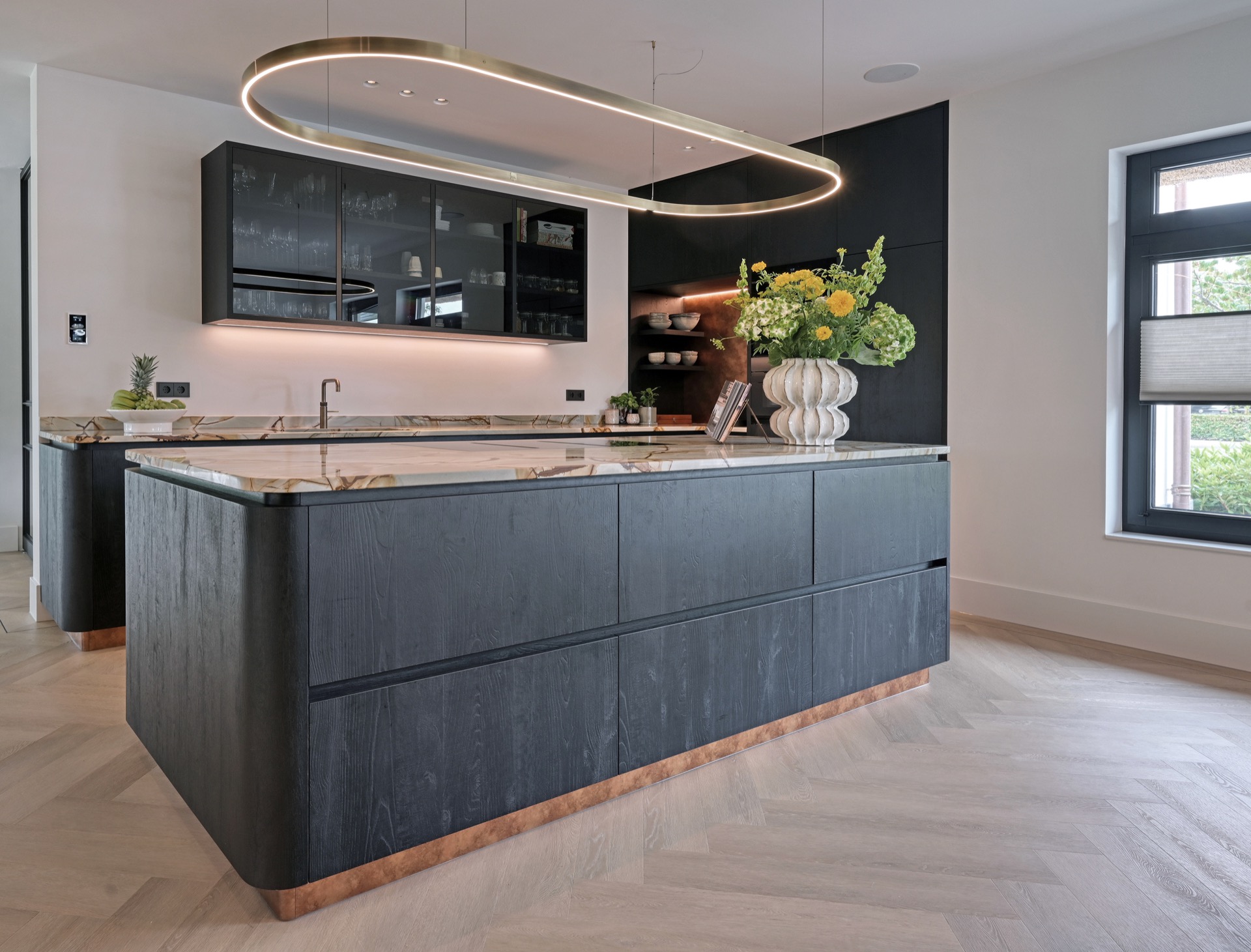 indirect LED lighting in a luxury villa interior: modern kitchen with dark cabinetry and a curved LED line in the ceiling, Luxury, Design, Exclusive, Modern, Custom Made, Special, Beautiful