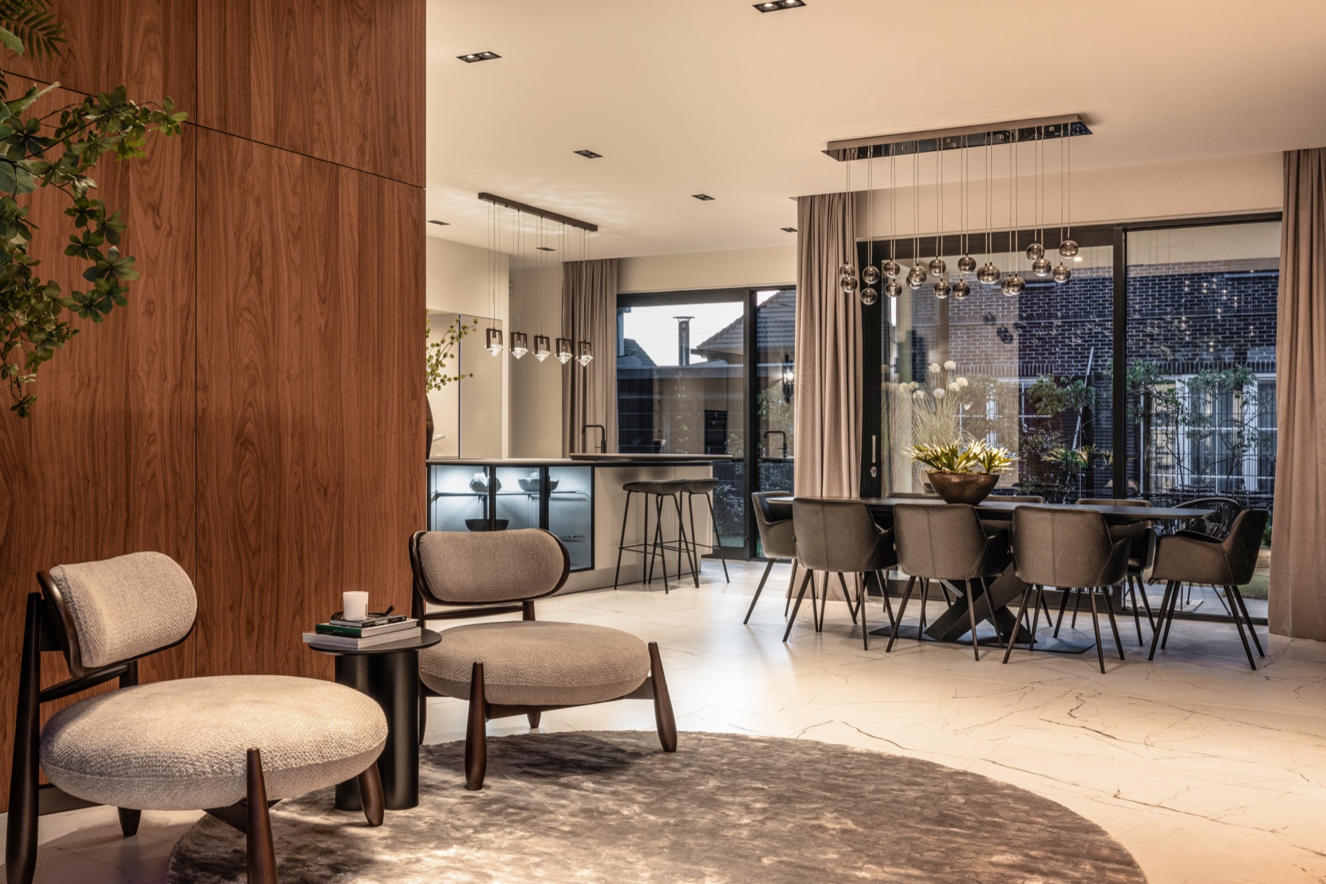 luxury pendant lighting interior: luxury living area with wooden wall panels and spherical pendant lights over dining space, Luxury, Design, Exclusive, Modern, Custom Made, Special, Beautiful