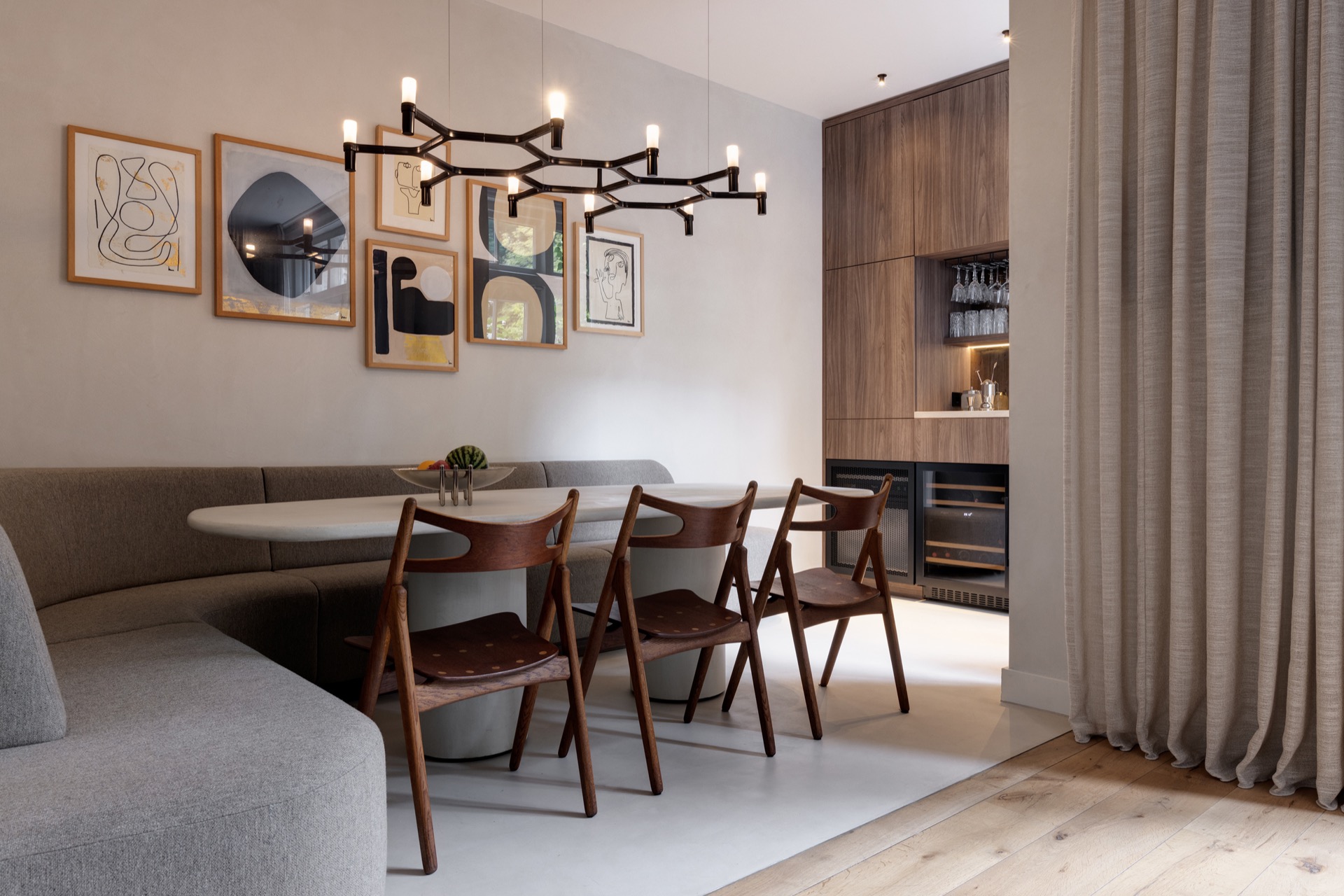 interior lighting plan: dining area with track lighting and a wooden kitchen bar wall with warm underlighting, Luxury, Design, Exclusive, Modern, Custom Made, Special, Beautiful