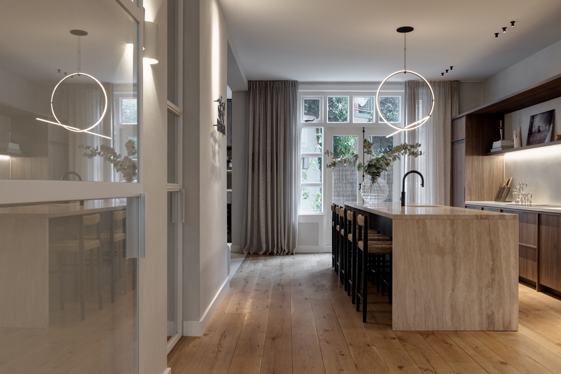 interior lighting plan: living-dining area with two circular pendant light rings and curtains by a large window, Luxury, Design, Exclusive, Modern, Custom Made, Special, Beautiful