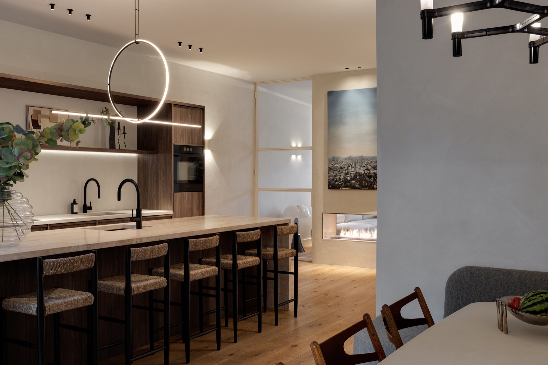 interior lighting plan: kitchen with bar and circular light ring over the countertop, with a warm fireplace niche in back, Luxury, Design, Exclusive, Modern, Custom Made, Special, Beautiful