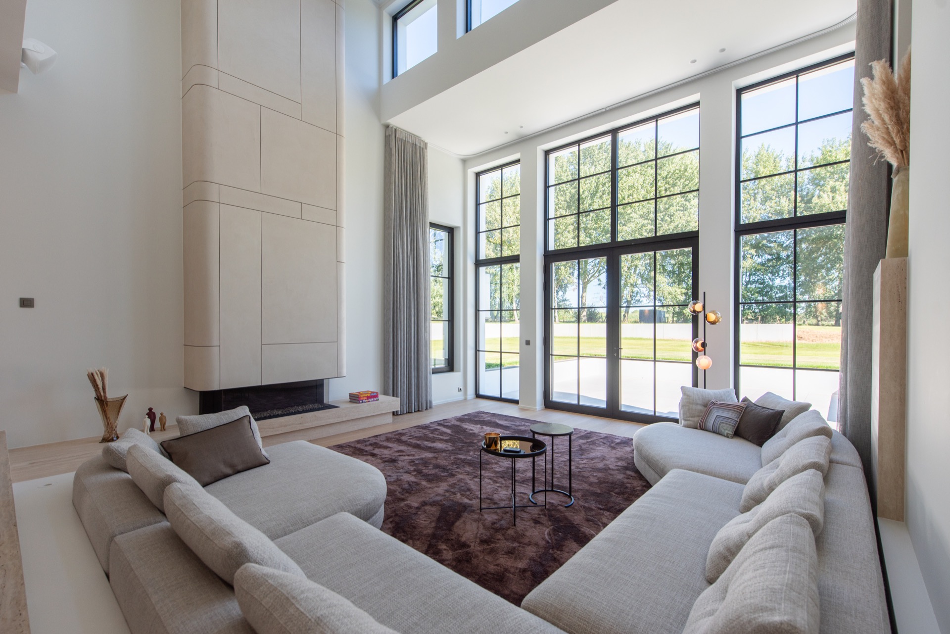 modern villa interior: modern living room with large window panels and sleek fireplace wall, Luxury, Design, Exclusive, Modern, Custom Made, Special, Beautiful