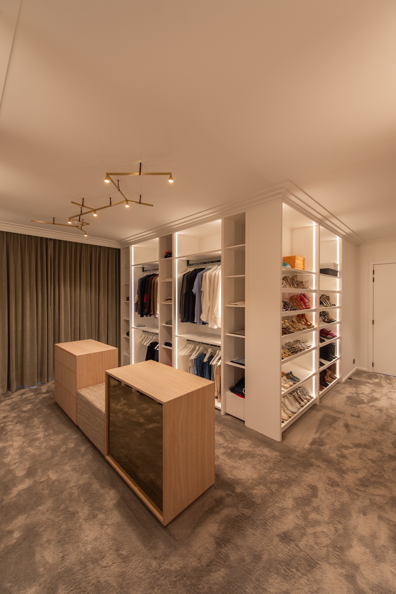 modern villa interior: dressing room with illuminated cabinet wall, storage blocks and modern built-in finish, Luxury, Design, Exclusive, Modern, Custom Made, Special, Beautiful
