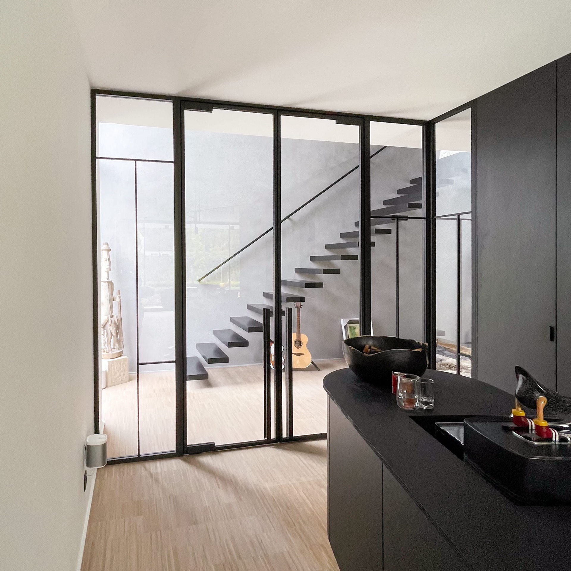 Steel look pivotdeur met zwart kozijn en zicht op trappenhuis, Luxury, Design, Exclusive, Modern, Custom Made, Special, Beautiful