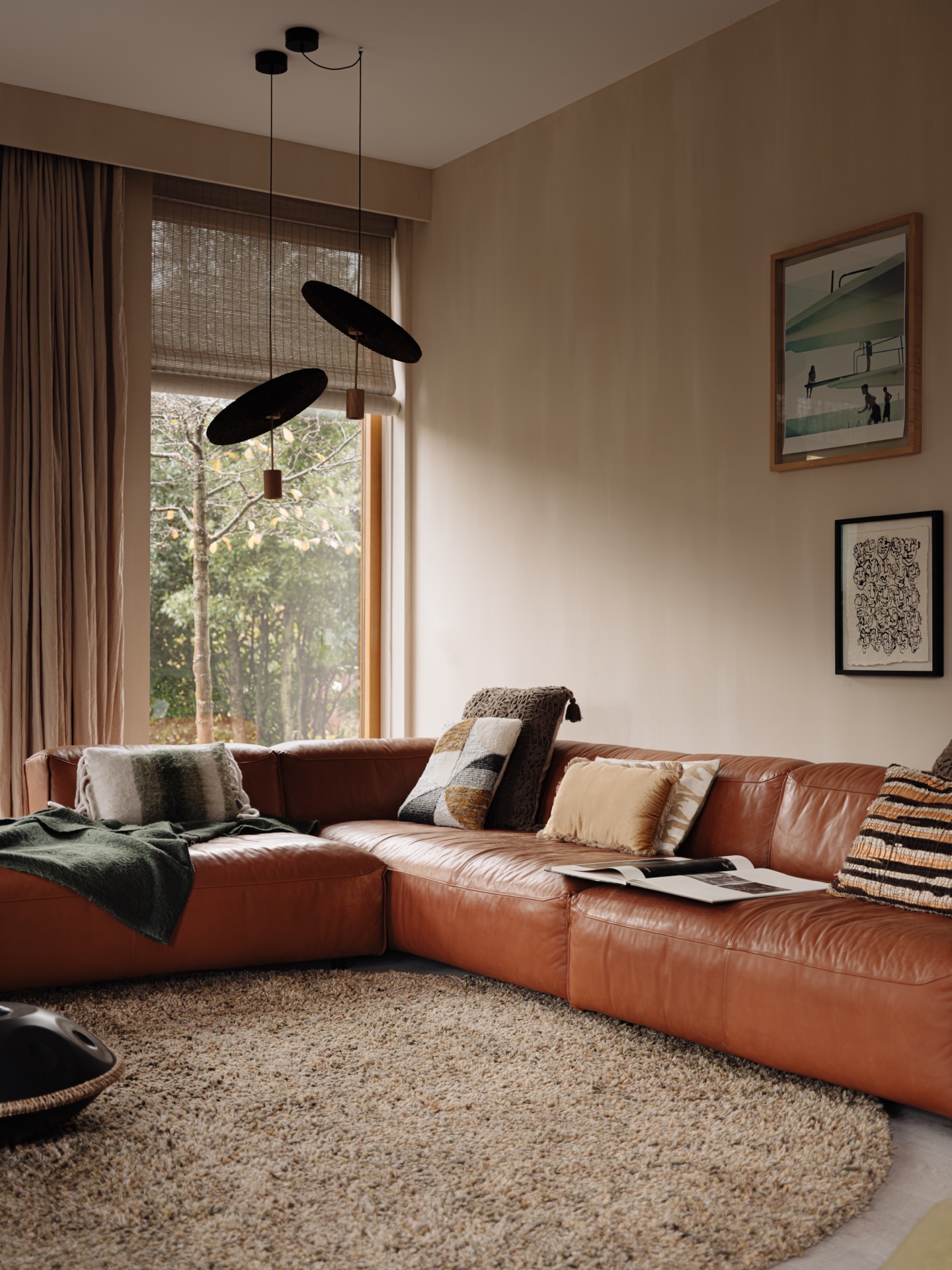 villa interior renovation: living room with leather sofa, curtains and pendant lights by large windows, Luxury, Design, Exclusive, Modern, Custom Made, Special, Beautiful