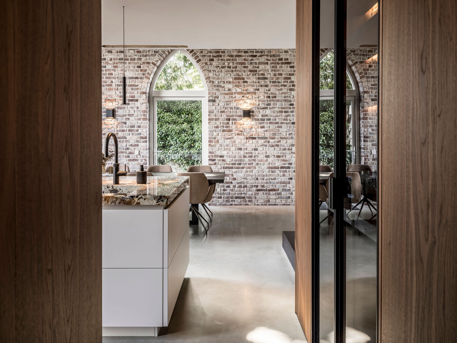 custom walnut kitchen with natural stone countertop: landing area with walnut walls, minimal lighting and staircase, Luxe, Design, Exclusief, Modern, Maatwerk, Bijzondere, Mooie