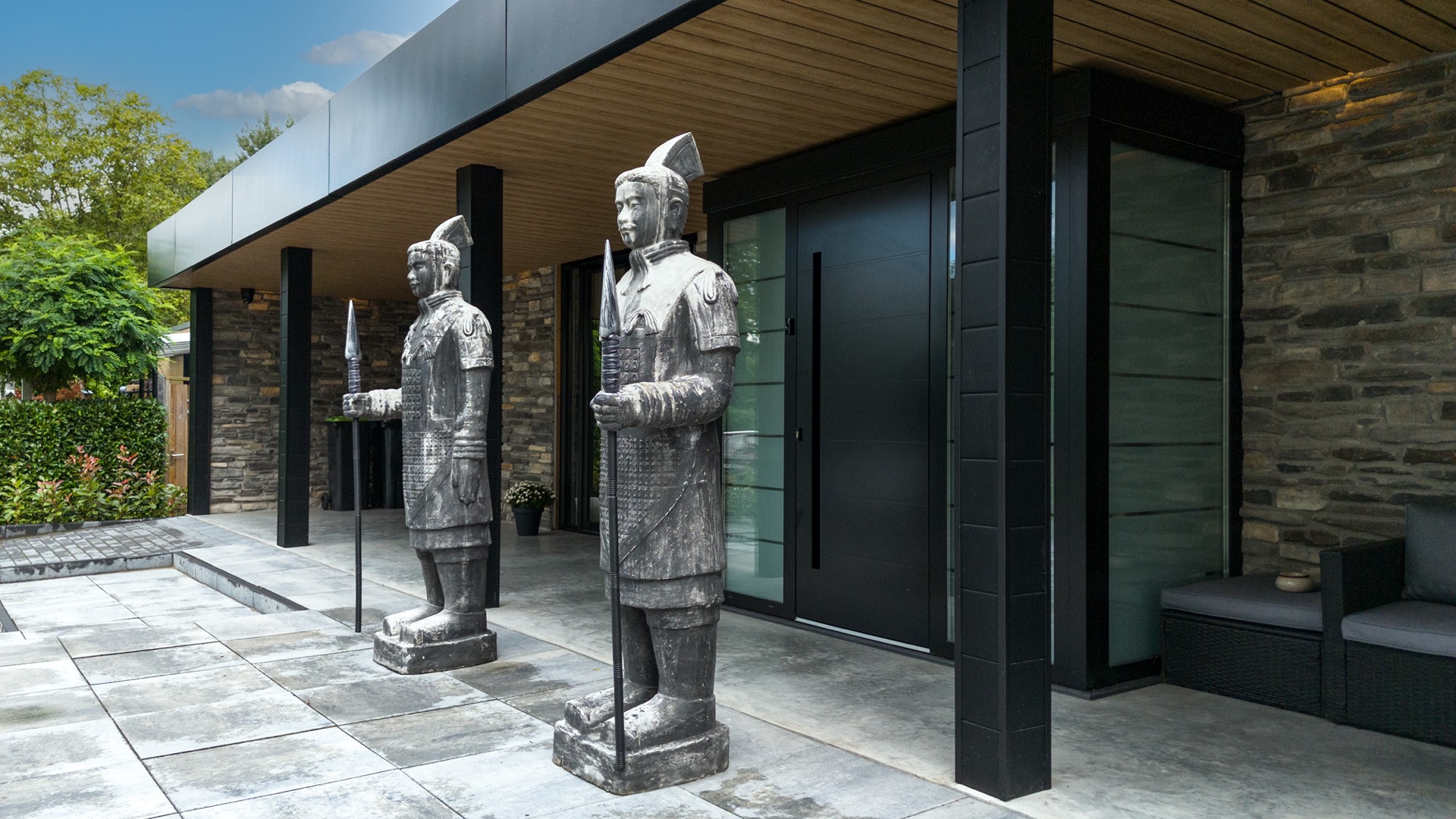 modern home natural stone strip cladding: overview of a modern terrace with natural stone base, wood facade and large glass, Luxe, Design, Exclusief, Modern, Maatwerk, Bijzondere, Mooie