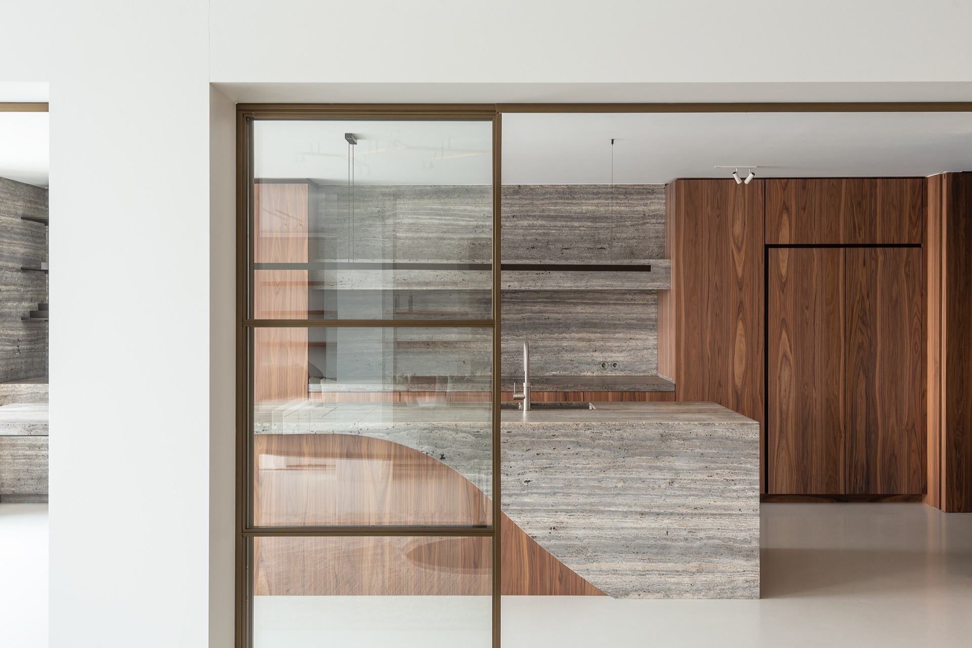 penthouse interior renovation: kitchen with natural stone backsplash wall and walnut cabinetry, Luxe, Design, Exclusief, Modern, Maatwerk, Bijzondere, Mooie